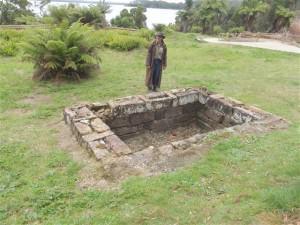 Kiah Davey on Sarah Island at the remains of an historic structure
